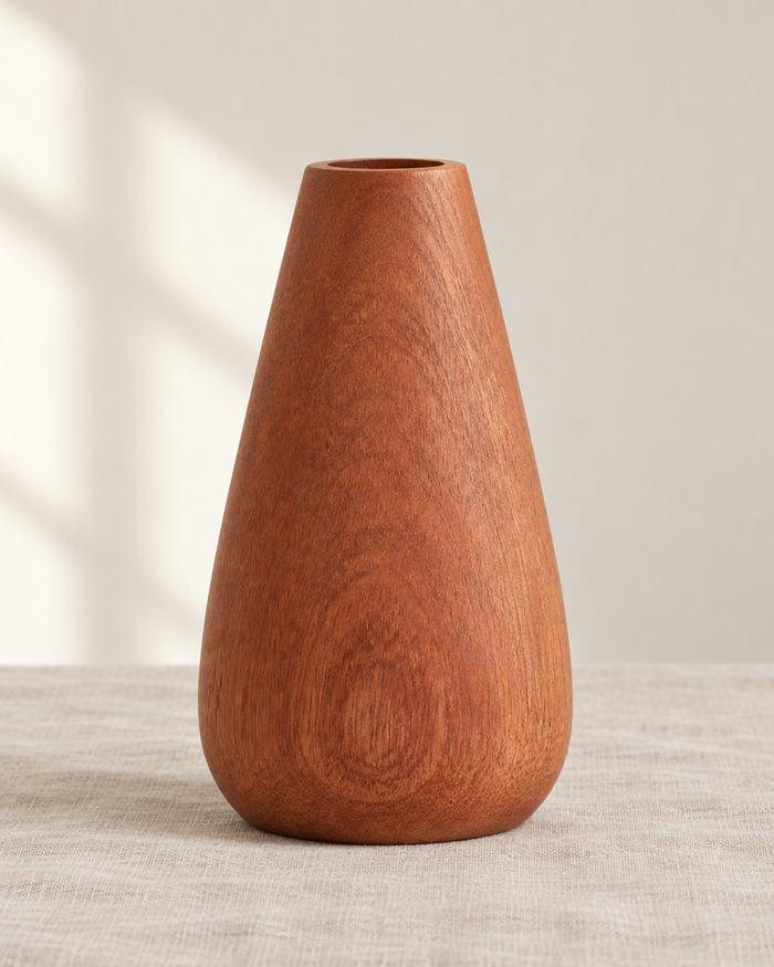 Reddish Brown Wooden Teardrop Vase, shown alone on a linen background