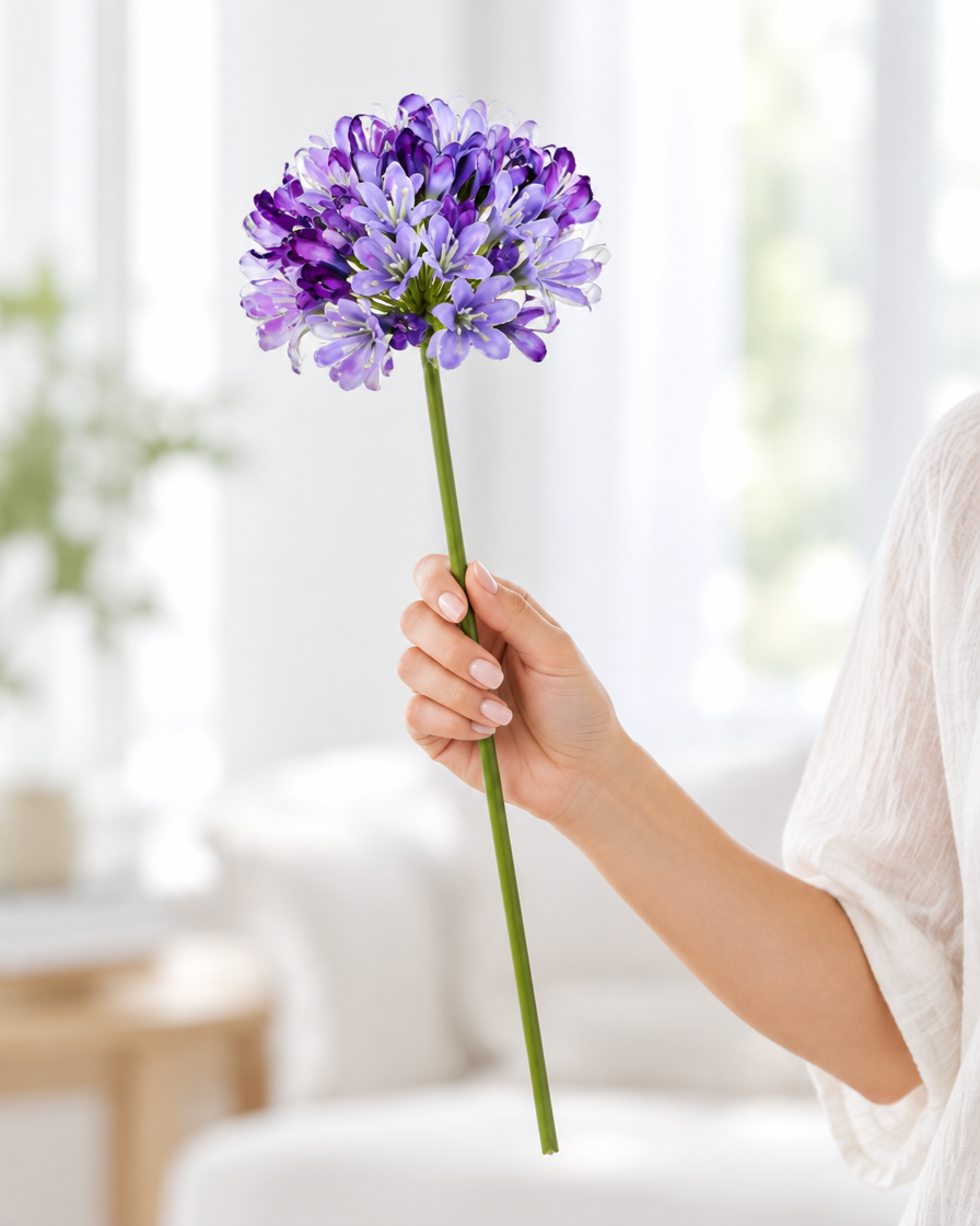 Purple Artificial Agapanthus Stem held in a hand