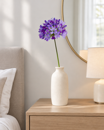 Purple Artificial Agapanthus Stem styled in a ceramic vase on a dresser (vase sold separately)
