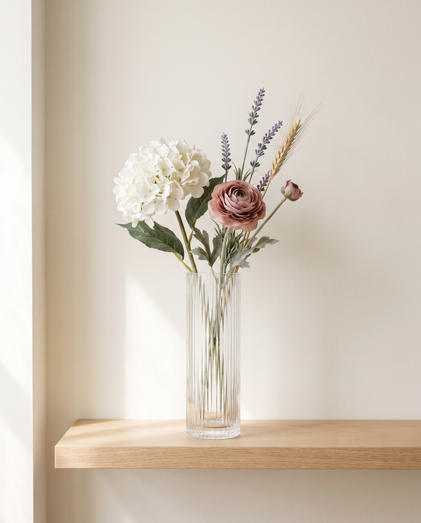 Artificial flower stems in a ceramic vase